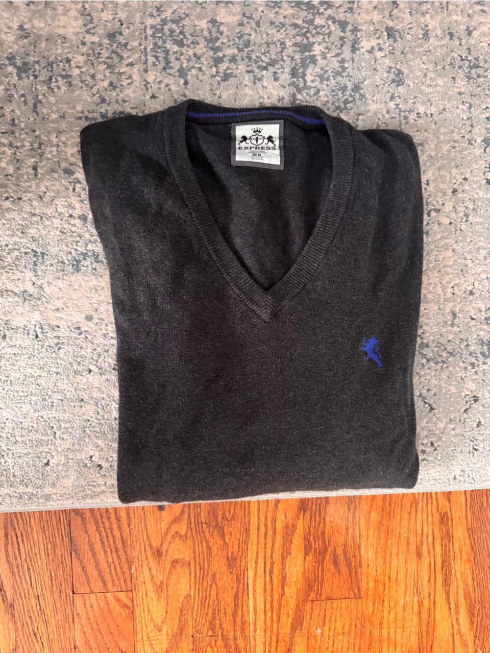 Express Men's Black V-Neck Sweater with Blue Emblem